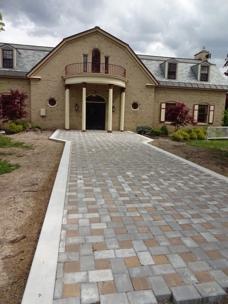 Classy brick sidewalks will lead to the entrances to the Art and Home Center.